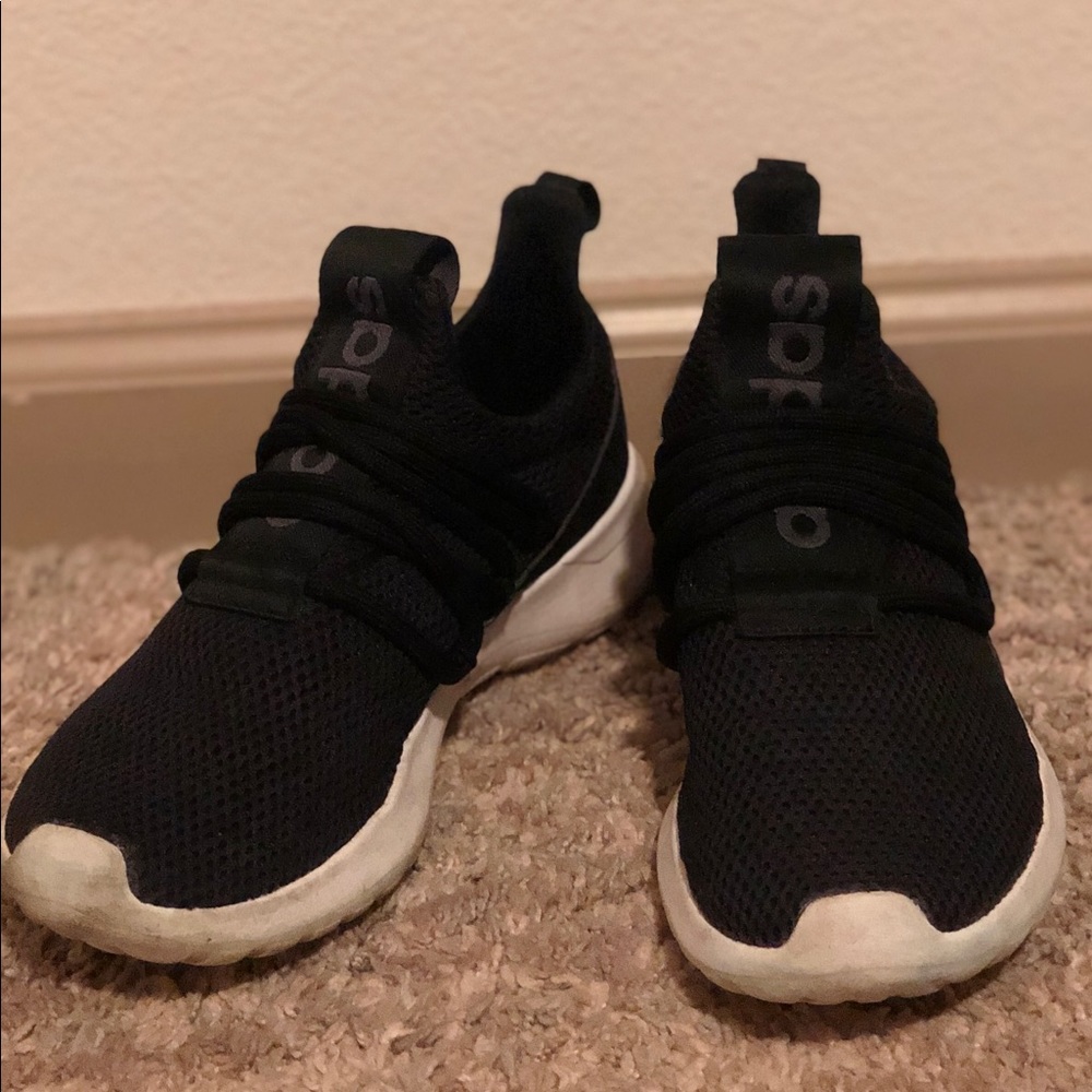 Black adidas shoes.